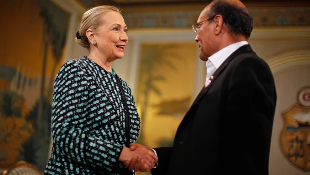 Clinton urges Tunisians to protect new freedoms