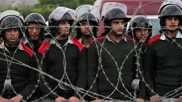 Egypt’s military warns of plots on eve of strike