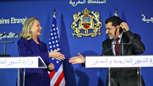 Clinton appeals for all Syrians to abandon Assad