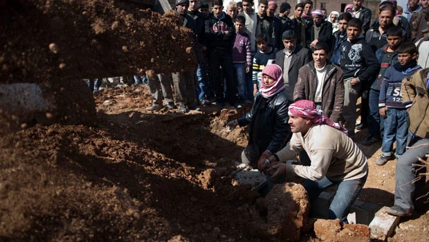 Defiant Syria pounds rebel strongholds