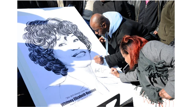 Whitney Houston’s voice soars at hometown funeral