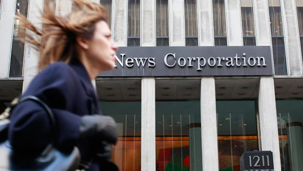 Staff at The Sun tabloid arrested in bribe inquiry