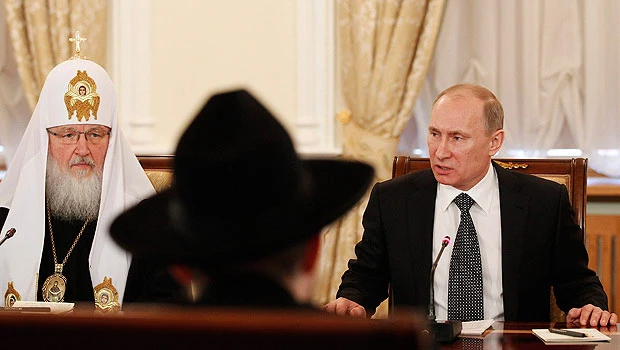 Russia’s Putin warns against outside interference