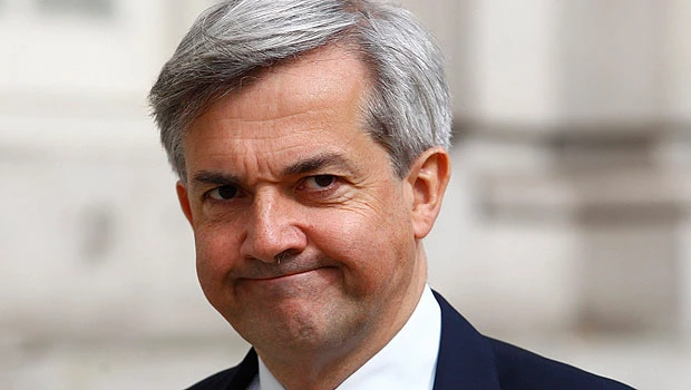 UK minister quits Cabinet to fight criminal charge