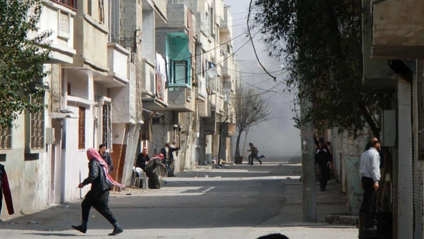 Syria forces attack town; Annan receives Assad response