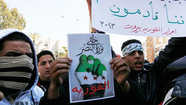 EU slaps sanctions on Assad’s family; mortars hit Homs