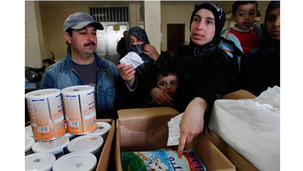 Assad vows to keep fighting; Obama says end is near