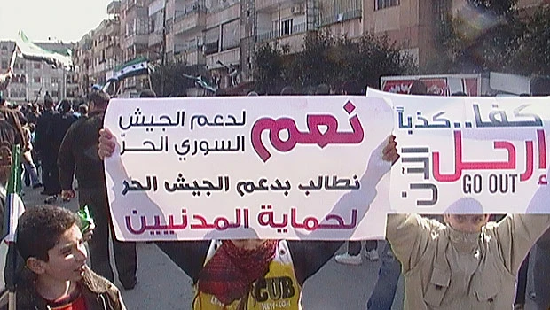 Aid convoy reaches Homs, massacre feared
