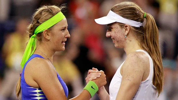 Jankovic exits, Azarenka battles through
