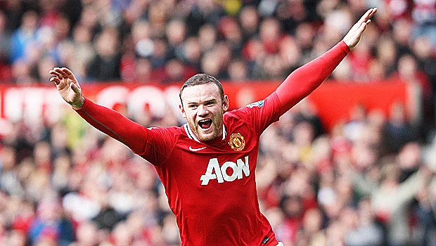 Rooney goals lift Man United top after City lose