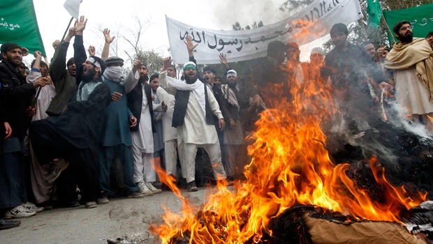 Afghan officials attacked at US killing spree site
