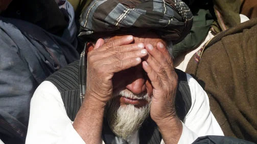 Afghan gun massacre families paid compensation