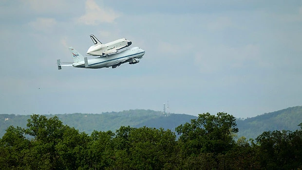 Enterprise lands in New York atop jet