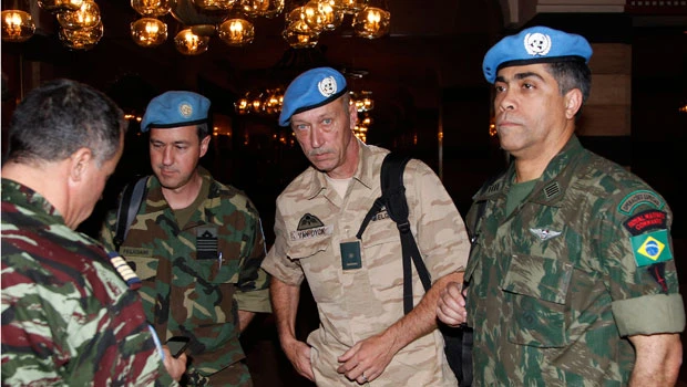 Shots fired in Syria town during UN observer visit