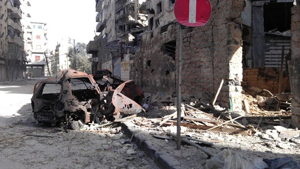Syrian troops pound Homs, Daraa as regime pledges truce