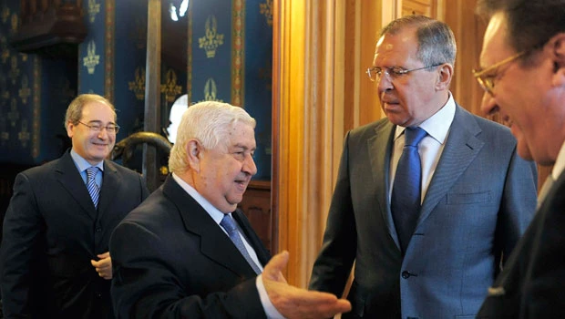 Syria claims troop pullout