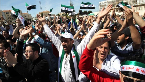 Syria truce largely holds but 5 killed in protests