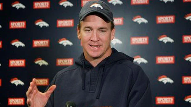Manning goes to work with his new team