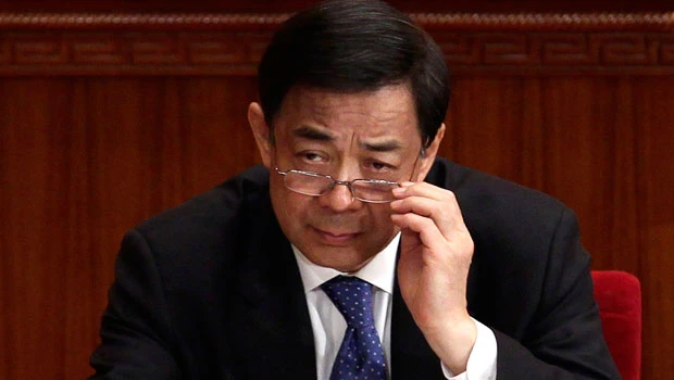 China ousts top politician, accuses wife of murder