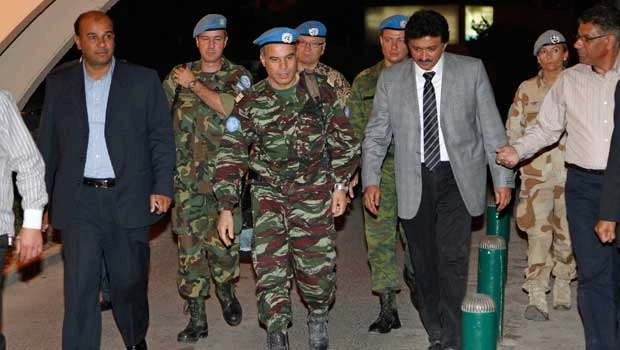 Syrian troops attack Damascus suburb despite UN truce monitors