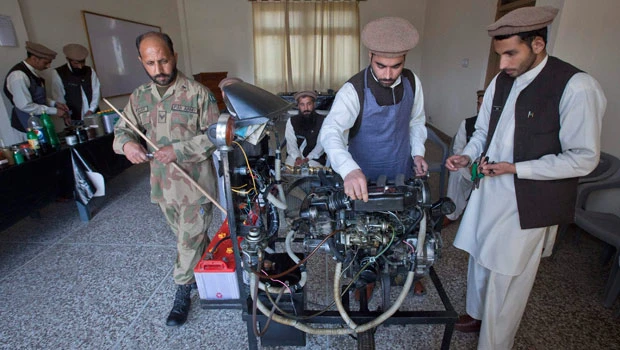 Pakistan army uses bullets, and classrooms to fight militancy