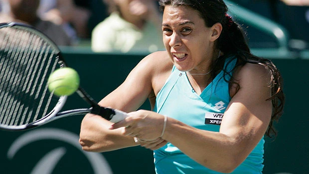 Third seed Bartoli holds on at Family Circle
