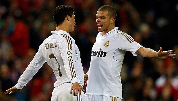 Real crushes Atletico to restore four-point lead