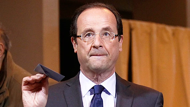 Hollande edges Sarkozy in French vote, Le Pen surges
