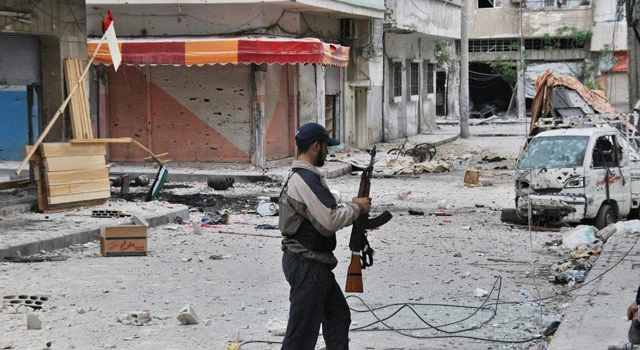 Clashes rage in Syria, opposition meets abroad