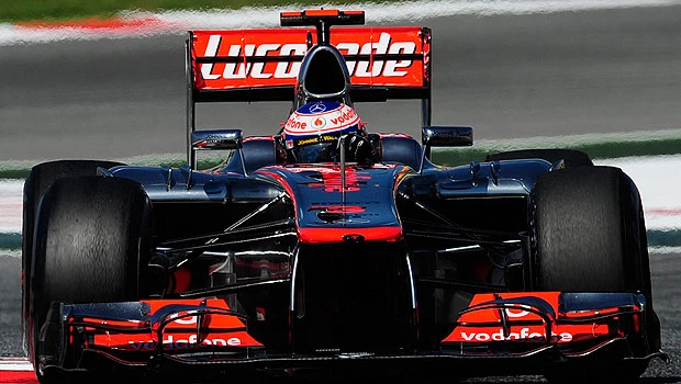 Button sews up quickest time in Spain