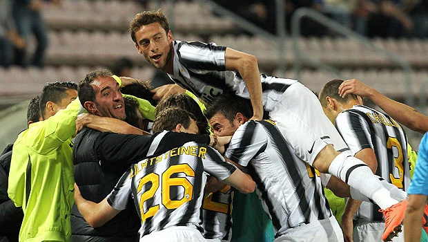Juventus lifts Italian title; Man City on brink