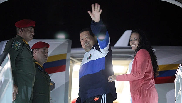 Venezuela’s Chavez reappears in public, back to Cuba