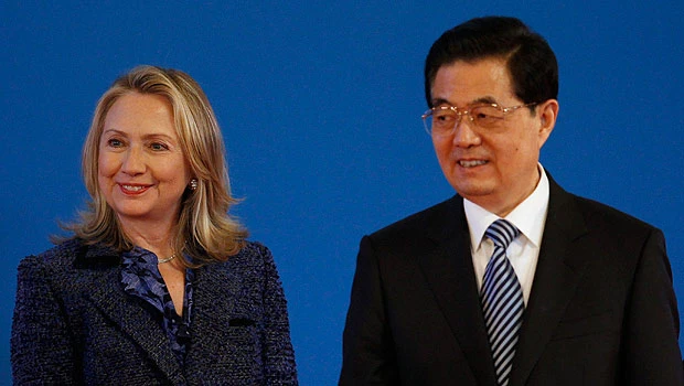 Clinton urges China to help on Iran, North Korea
