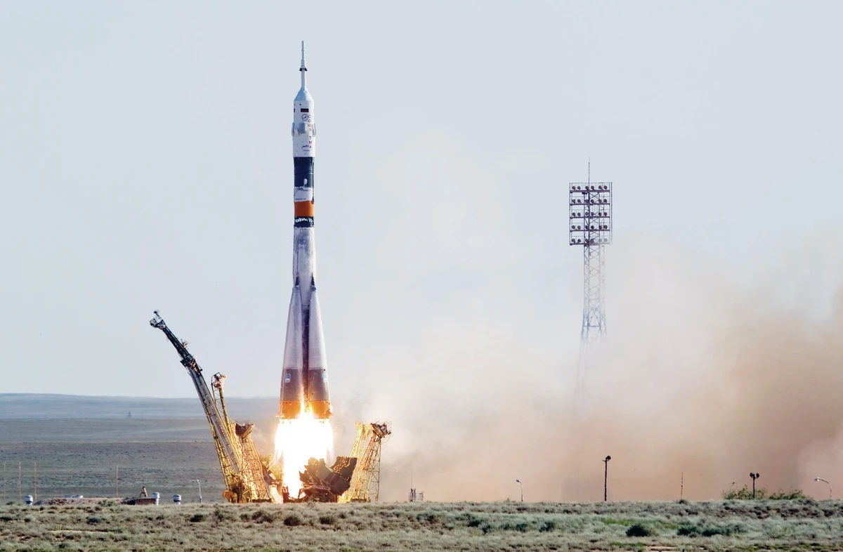 Soyuz crew departs for orbital voyage