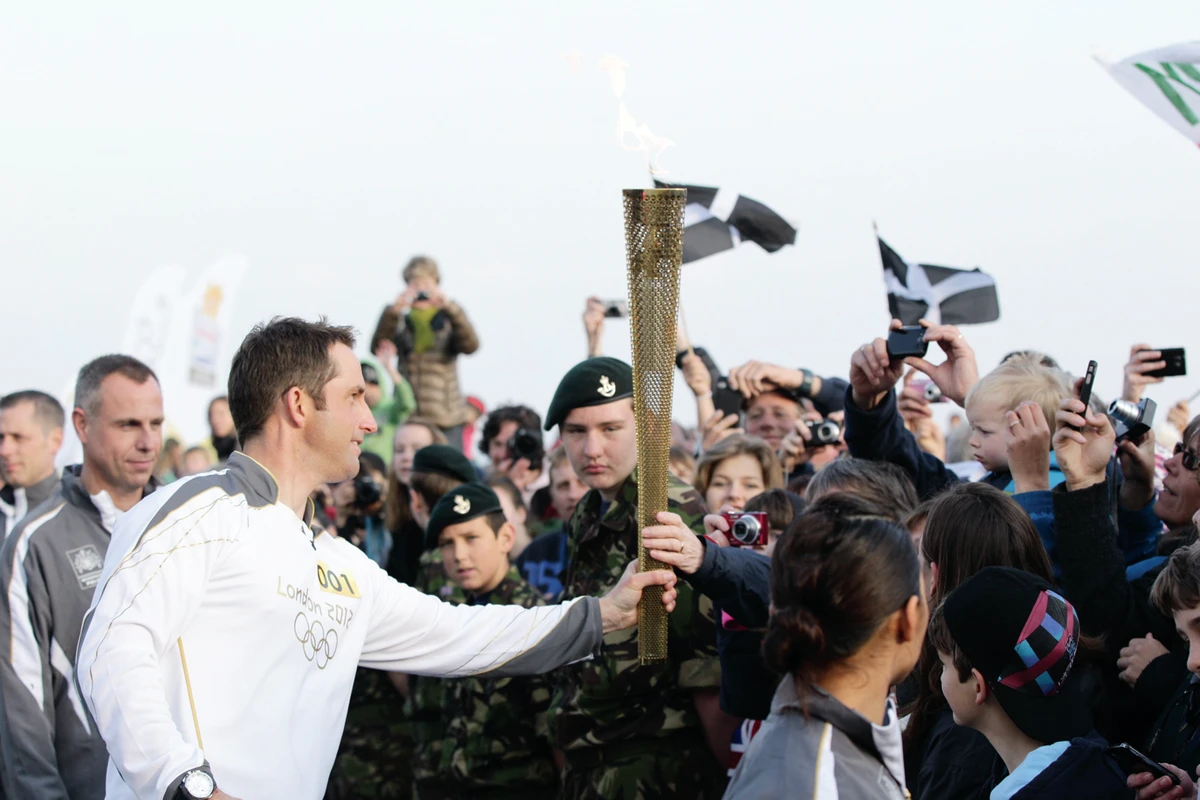 Thousands greet start of London 2012 torch relay