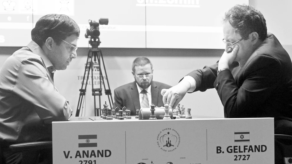 Anand wins shootout to keep world chess crown