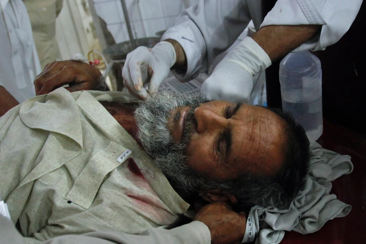Suicide bombing in Pakistani market kills 20