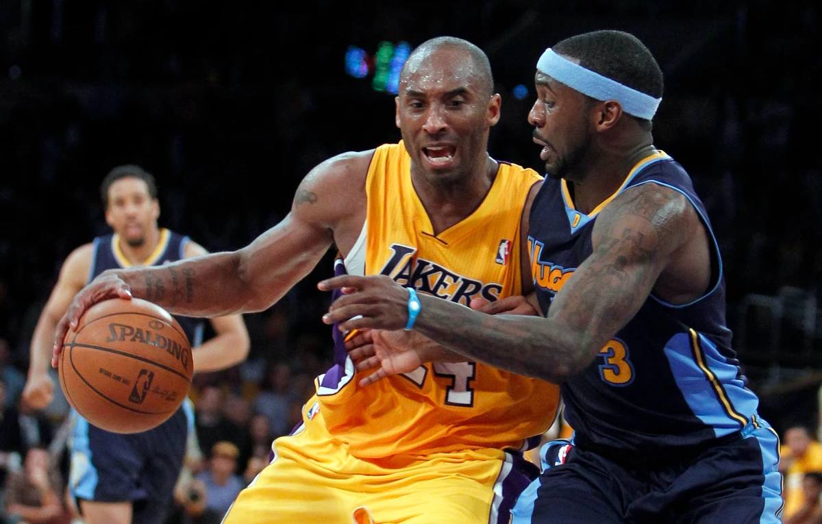 Bryant haul helps Lakers hold off Nuggets rally