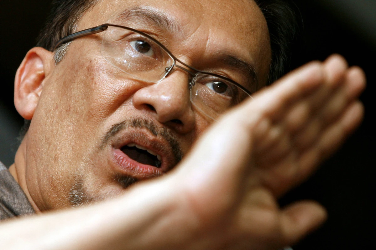 Malaysia’s Anwar faces charges over protest as election looms