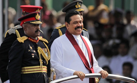 Sri Lanka lowers outlook for ailing rupee