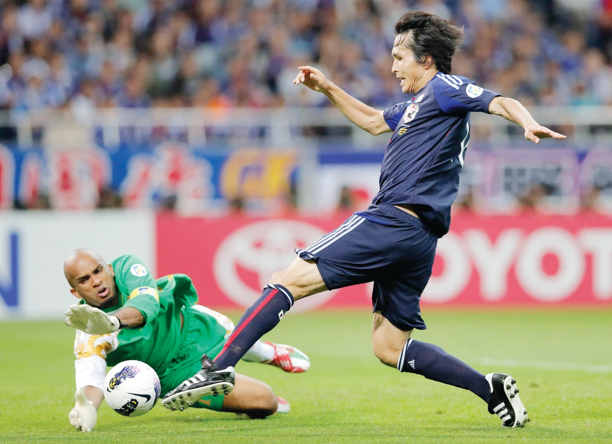 Japan cruises as Uzbeks rue unseen goal