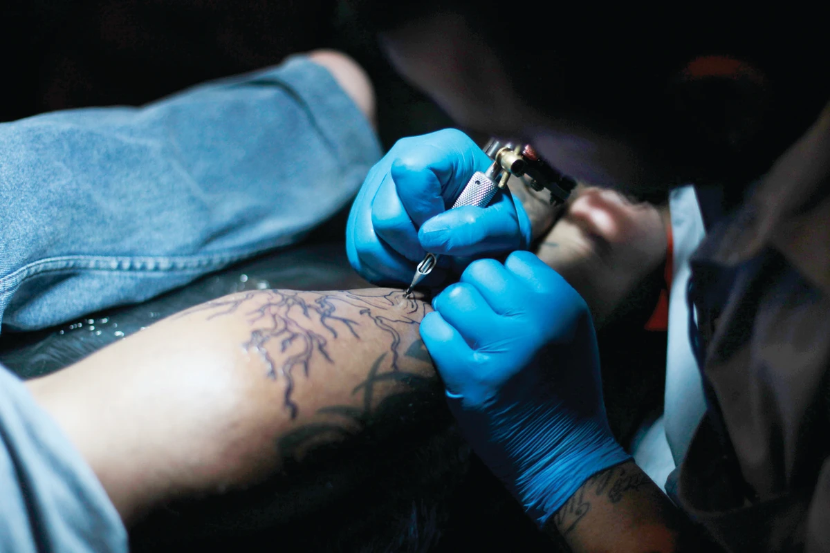 Japan tattooist draws line between art and underworld