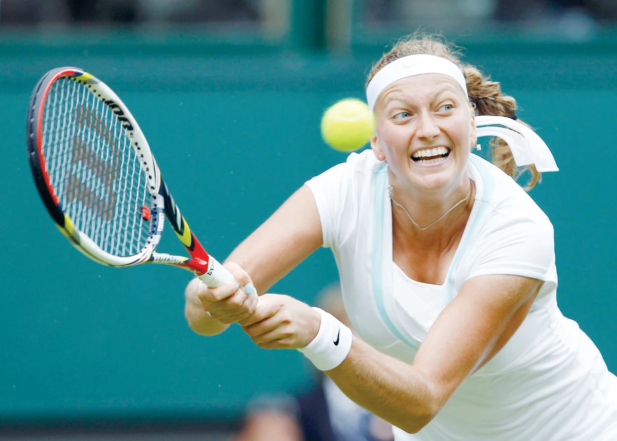 Kvitova overcomes shaky start in title defense