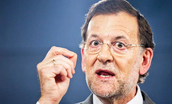 Spain PM hails euro lifeline for banks as victory