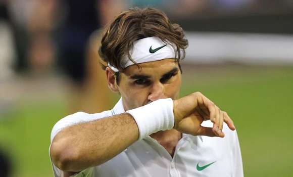 Federer avoids upset, Djokovic and Sharapova march on