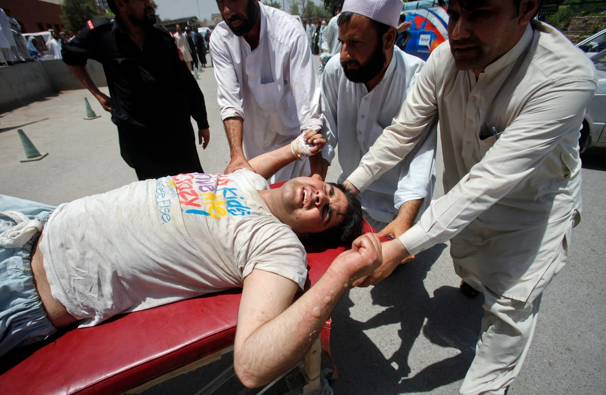 Bomb kills 26 in Pakistan market, 65 wounded