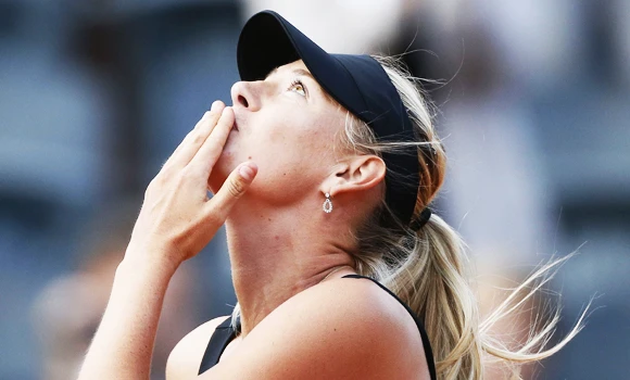 Sharapova into French Open final, regains top spot