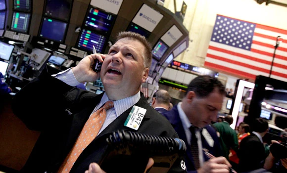 Stocks mixed as dollar slips
