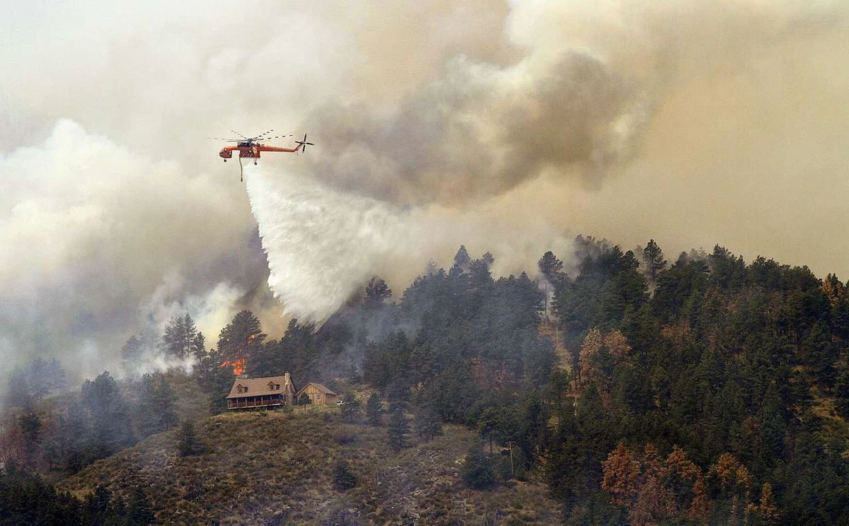 One killed in massive US mountain blaze; smoke blankets Denver