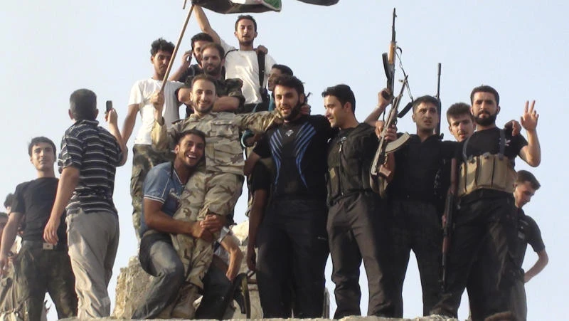 Tens of thousands flee Syria’s largest city as fighting rages